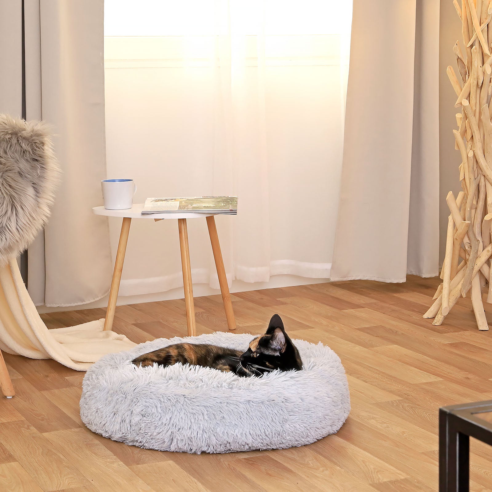 Lit rond pour chat en forme de beignet en peluche